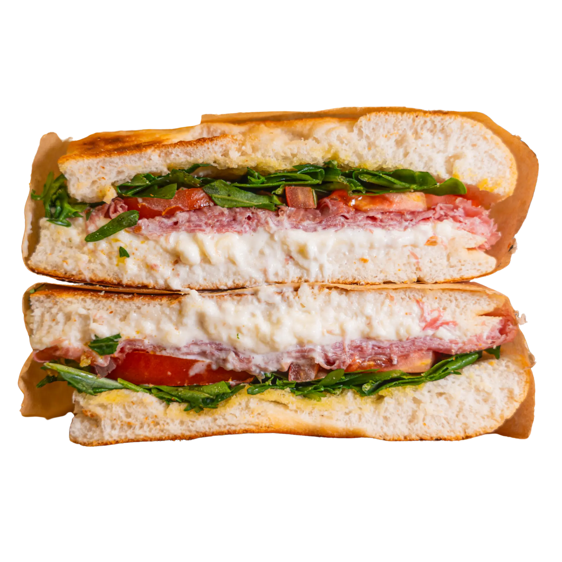 Signature Prosciutto focaccia sandwich cut in half