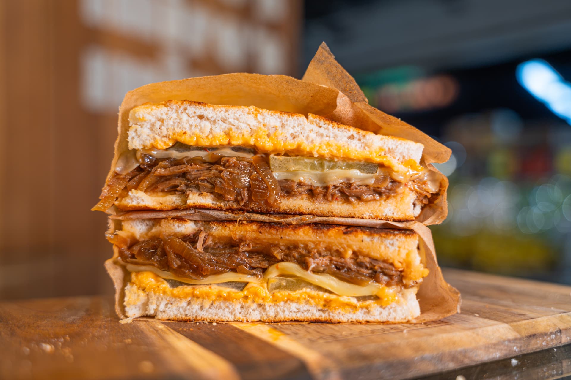 The Brisket focaccia sandwich stacked and wrapped.